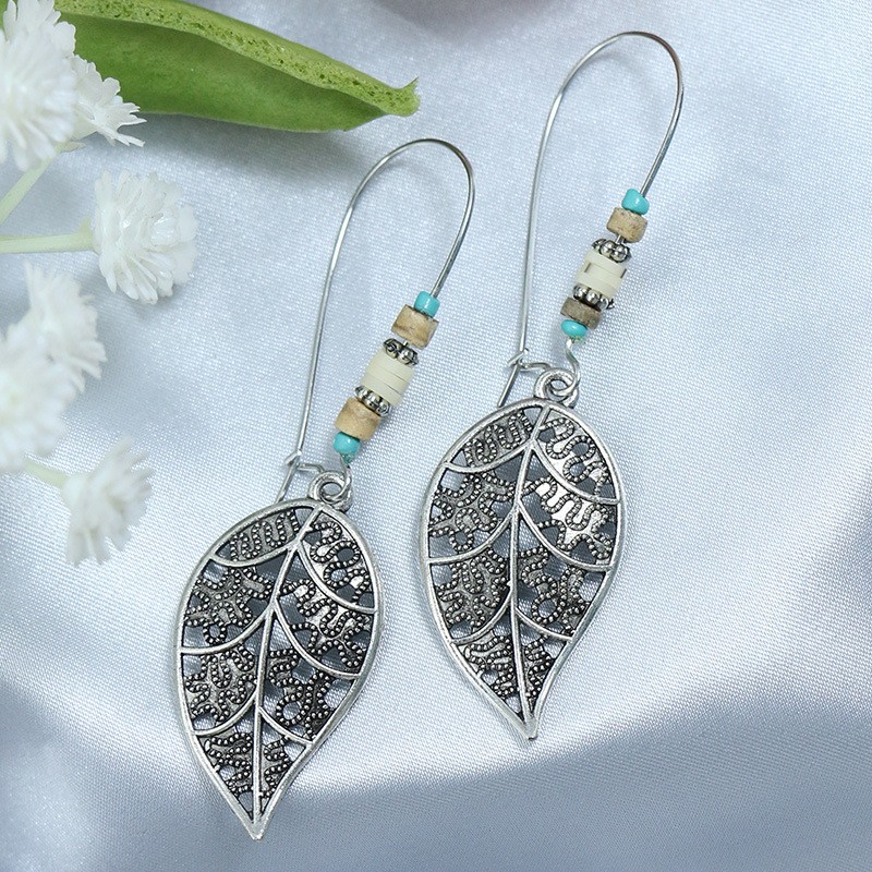 Ethnic Style Geometric Metal Turquoise Inlaid Tassel Earrings