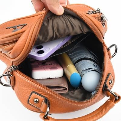 OGEHUAFEE Womens Elegant Mini Backpack  Premium PU Crossbody/Backpack Hybrid with Kangaroo Logo & Tassel Accents