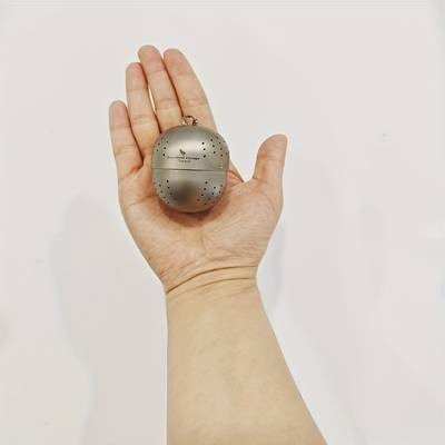 Portable Titanium Tea Infuser Ball with Chain Perfect for Outdoor Tea Brewing and Loose Leaf Tea Enthusiasts