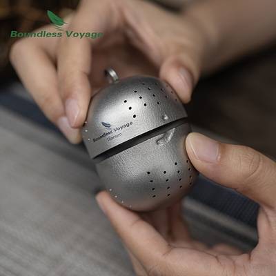Portable Titanium Tea Infuser Ball with Chain Perfect for Outdoor Tea Brewing and Loose Leaf Tea Enthusiasts