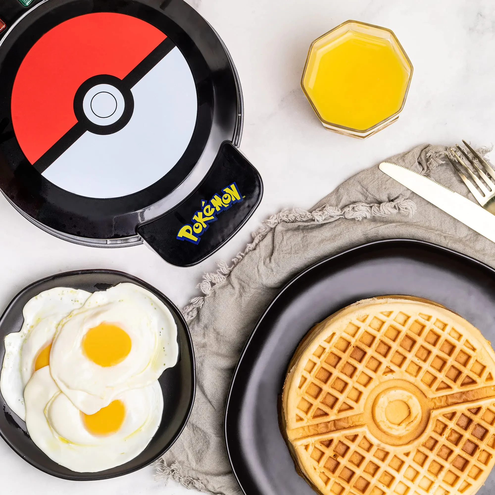 Uncanny Brands Pokmon Waffle Maker - Make Bounty Pokeball Waffles - Kitchen Appliance