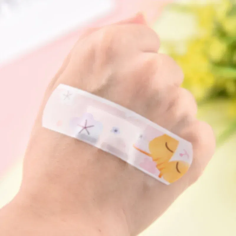 Color: Gold - 20pcs/lot Kawaii Cartoon Dinosaur Pattern Self-adhesive Band Aid Hemostasis Bandages Dressing Patches Tape Plaster for Children
