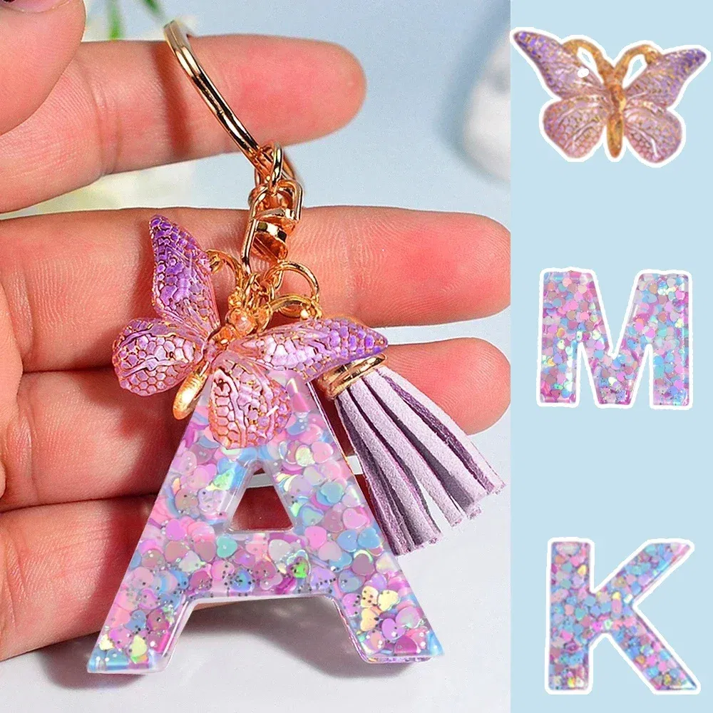Color: black - Fashion Tassel Butterfly 26Letter Keychain Colorful Love Heart Filled Resin Alphabet Keyring Women Girls Car Bag Phone Pendant