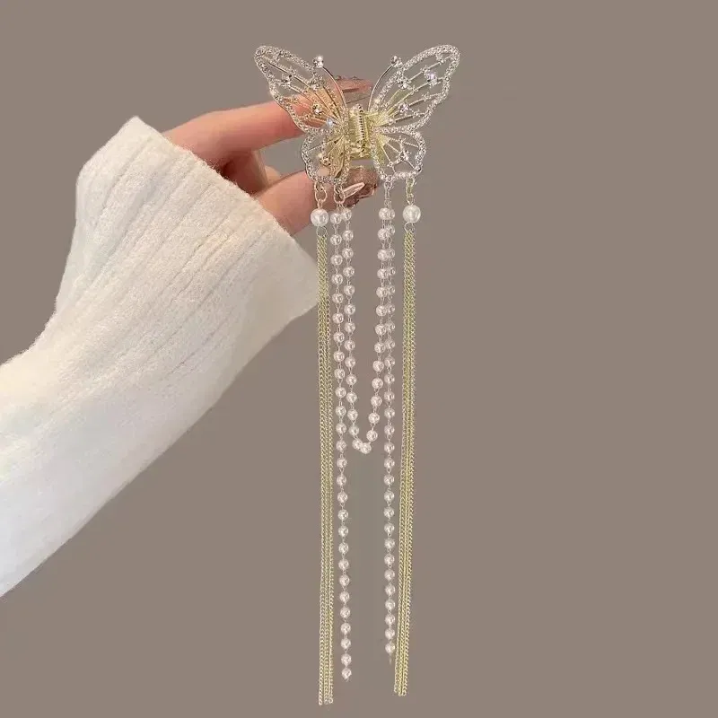 Color: GRAY - 2024 New Super Immortal Hollow Butterfly Tassel Women's Grab Clip Half Tie Hair Fashion Girl Pearl Pendant Hair Card Shark Clip