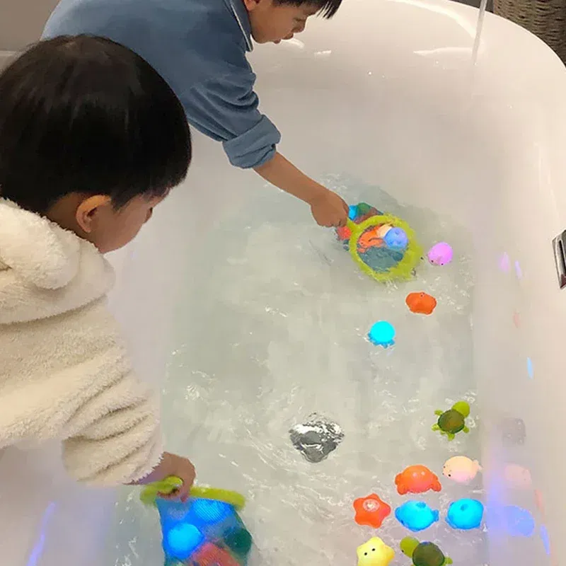 Color: WHITE - Baby Cute Animals Bath Toy Swimming Water LED Light Up Toys Soft Rubber Float Induction Luminous Frogs for Kids Play Funny Gifts