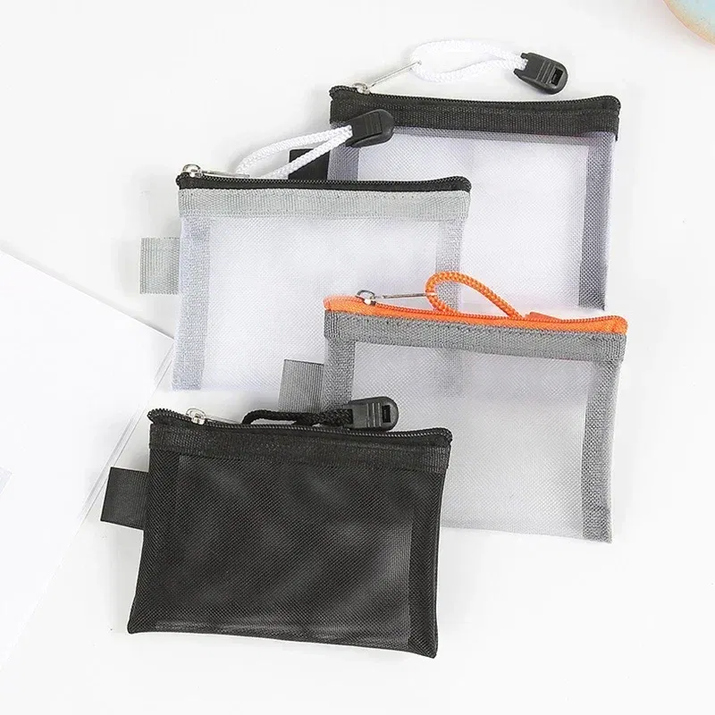 Color: Brown - Mini Mesh Coin Bags Money Earphone Data Line Storage Bags Bus ID Credit Card Holder Zipper Pouch Traveling Small Coin Wallet