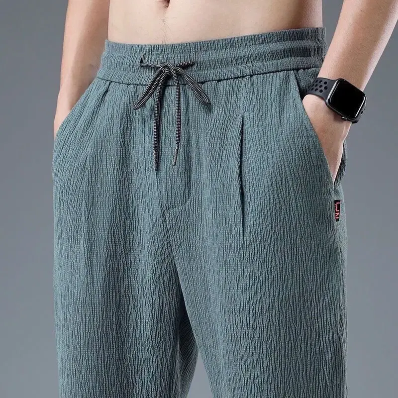 Color: black, Size: XXXL - Summer Ice Silk Man Jogger Linen Pants Casual Wide Summer Sweatpants Male Spring Lightweight Halking Harem Trousers