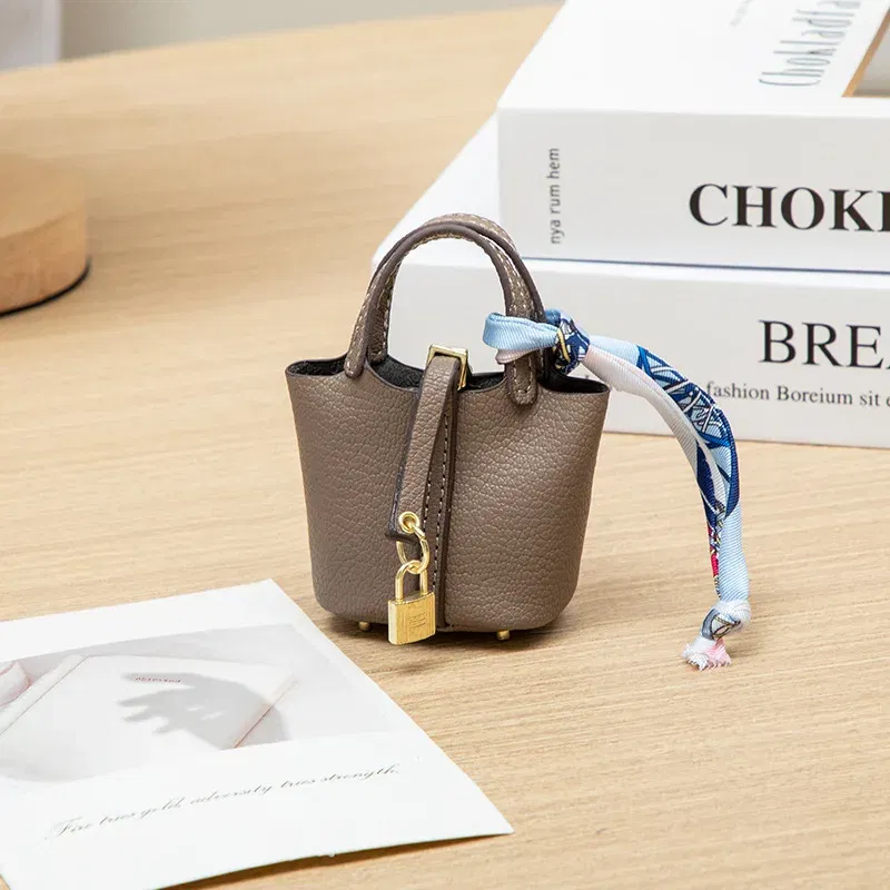 Color: green - Mini Bag Pendant Keychain Hanging Accessory Zero Wallet Creative Portable Bracelet Bluetooth Earphone Bag Multifunctional