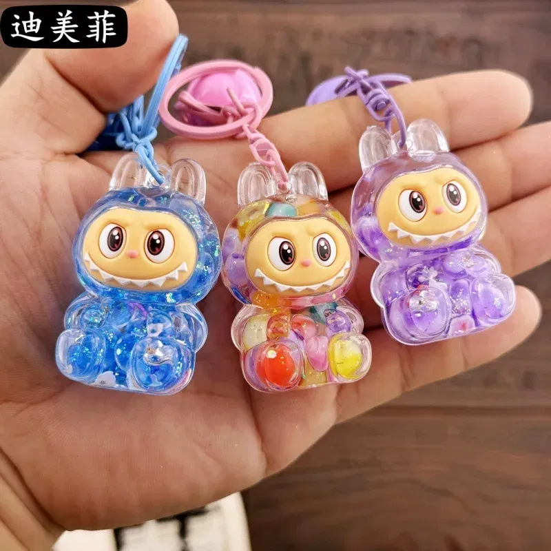 Color: Pink, Ships From: CHINA - Creative keychain oil series doll quicksand bottle small pendant gift decoration