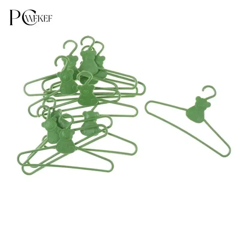 Color: plum - 10/20 PCS / Lot Lovely Green Hangers Mini Cute Wardrobe Dress Coat Clothes Plastic Accessories For Babi Doll Dollhouse Gift Toy