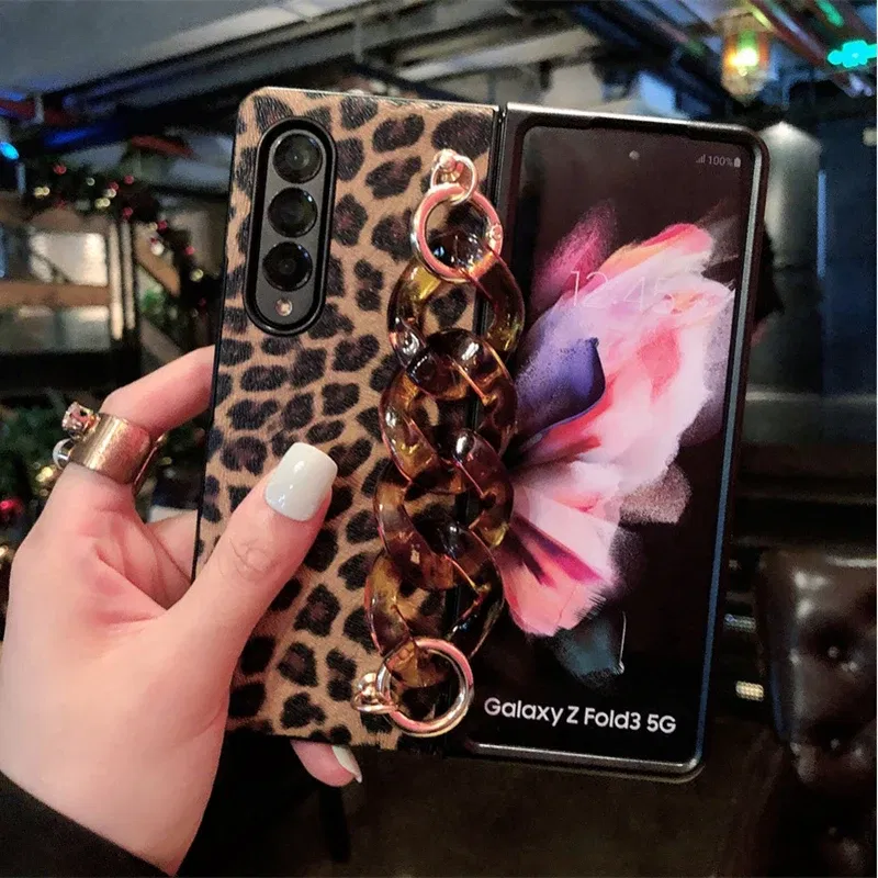 Color: Beige, Material: Aluminum - Luxury Leopard Print PU Leather Phone Case For Samsung Galaxy ZFold 5 Z Fold 4 Z Fold 3 5G Cover with Wrist Strap for Woman Girl