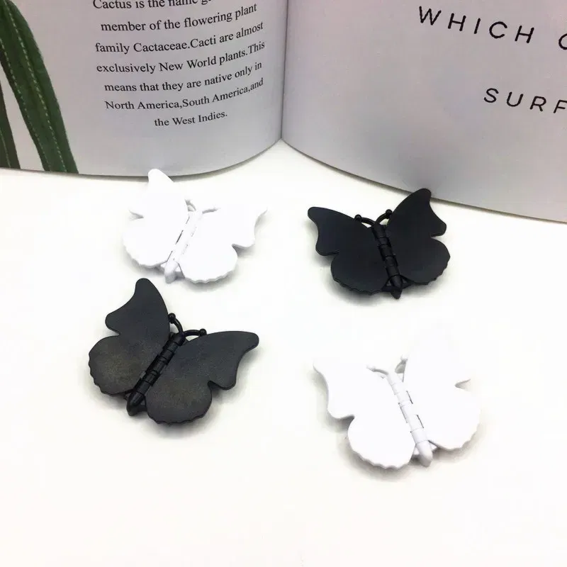 Color: black - 2pcs 360 Degree Phone Ring Stand Holder Butterfly Bling Glitter Universal Butterfly Wing holder finger ring holder