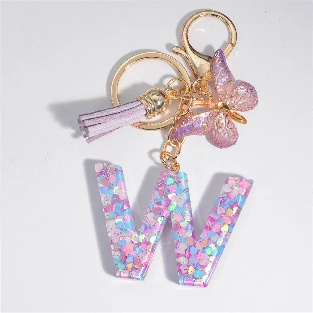 Color: WHITE - Fashion Tassel Butterfly 26Letter Keychain Colorful Love Heart Filled Resin Alphabet Keyring Women Girls Car Bag Phone Pendant