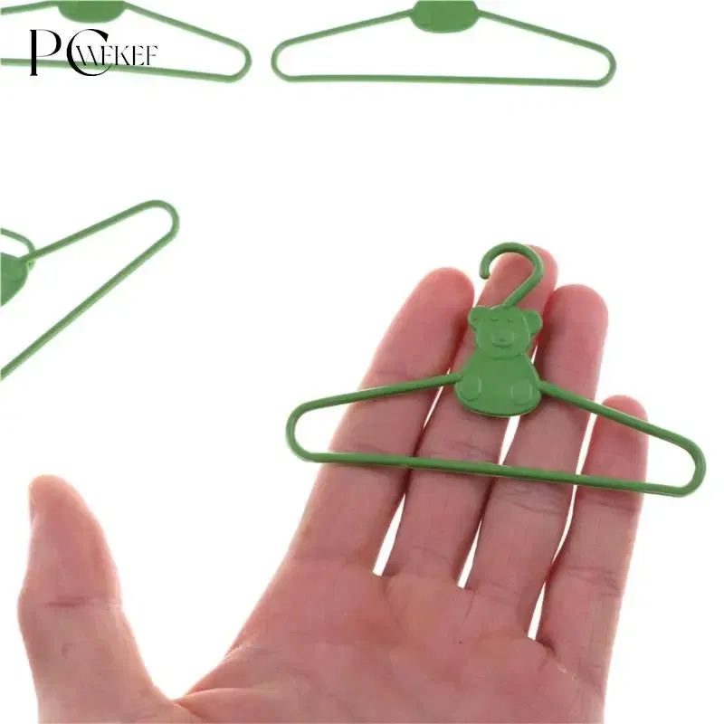 Color: ArmyGreen - 10/20 PCS / Lot Lovely Green Hangers Mini Cute Wardrobe Dress Coat Clothes Plastic Accessories For Babi Doll Dollhouse Gift Toy