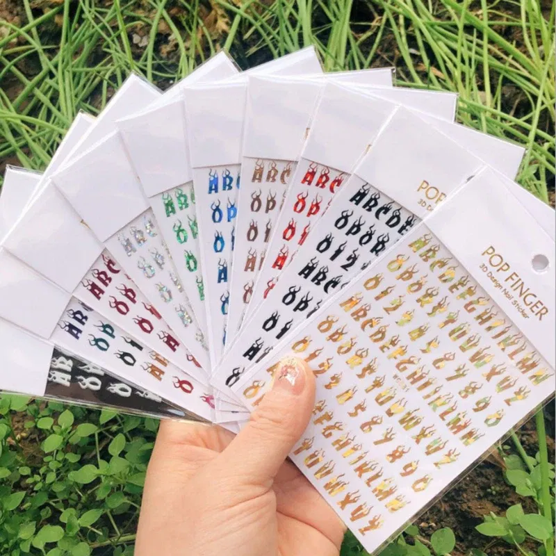 Color: Light Grey - 1PCS New English Alphabet Nail Stickers Multi-Color Laser Reflective Nail Slider Art Cool Text Nail Kit