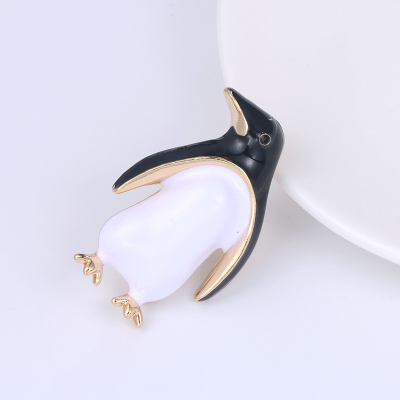Penguin pin corsage