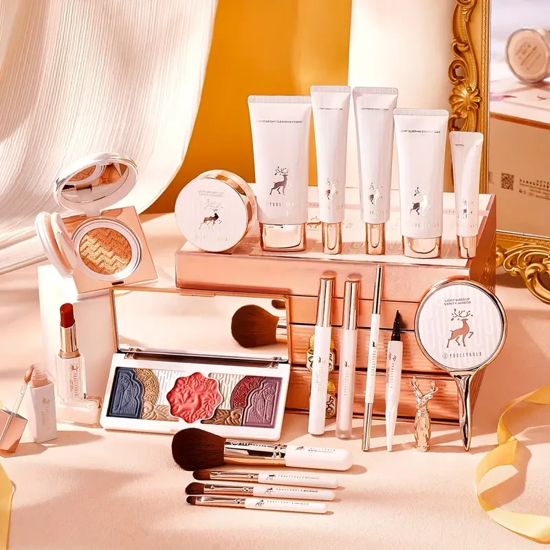 20pcs True Love Deer Gift Set: Nude Orange Lipstick, Ivory BB Cream & Concealer, 9-Color Eyeshadow Palette, Liquid Eyeliner Pen, Dual-Ended Brow Pencil, Mascara, Makeup Brushes (4), Prep Serum, Hand & Lip Balm, Sleep Mask with HD Mirror, Heart Greeting Ca