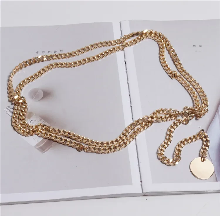 Ladies Dresses Decorated With Thin Belts And Chains