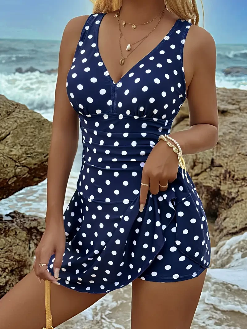Polka Dot One-Piece Swimsuit - Flattering V Neckline, Stylish Criss Cross Straps, Flowy Skirted Design for a Feminine Touch