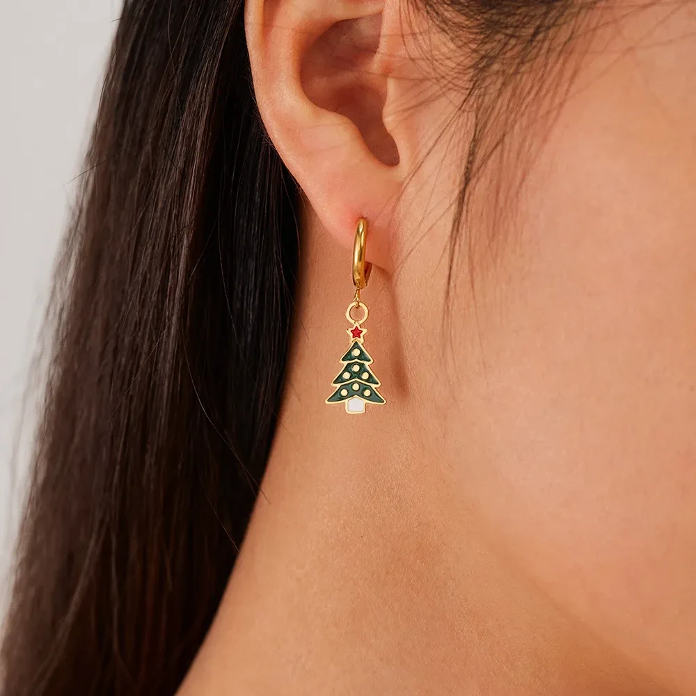 Shop the Christmas Element Earrings Female Fashion Stainless Steel perfect for the holiday season. Featuring snowflakes, reindeer, and Christmas trees, these stylish earrings add a festive touch to your look. Ideal for Christmas parties and gift-giving!