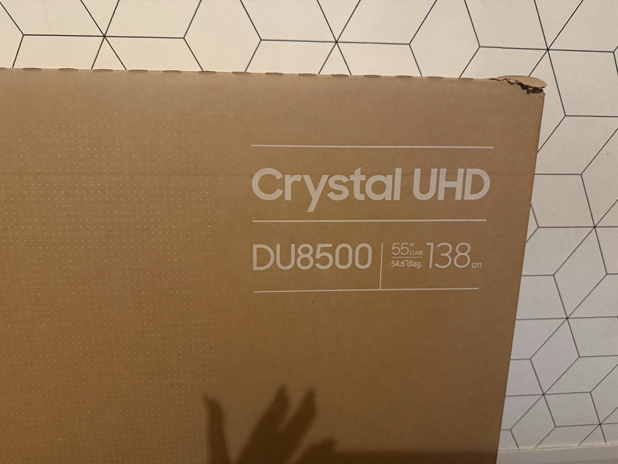 Boxed 55  samsung crystal UHD DU8500 and Soundbar C450