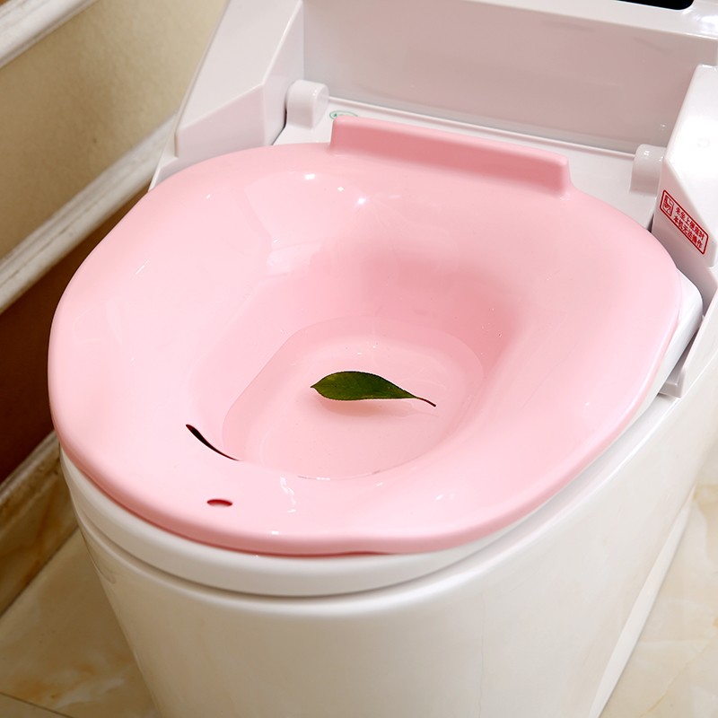 Pregnant women flushing bidet