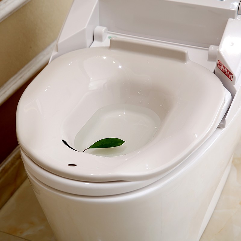 Pregnant women flushing bidet