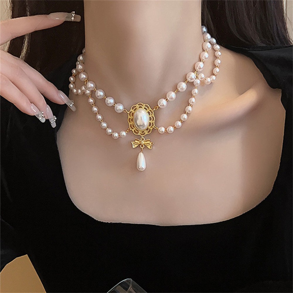 Elegant White Pearl Heart Necklace