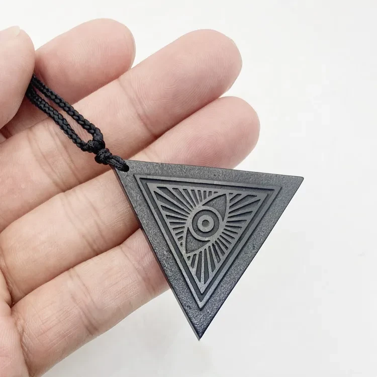 Triangular Pendant Carved In Rough Stone