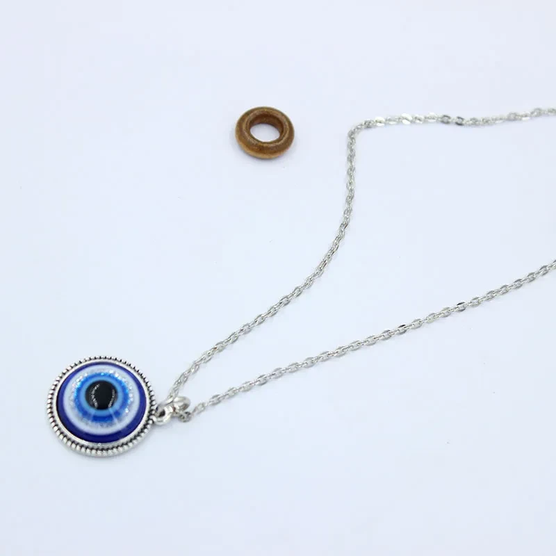 Resin blue eye pendant necklace