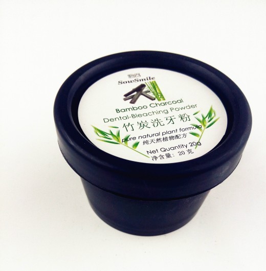 Activated carbon whitening tooth powder