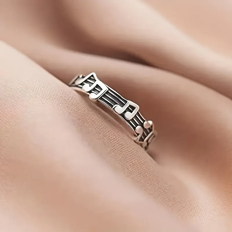 Cute Rhodium Plated Adjustable Music Note Alloy Ring: A Perfect Accessory for Music Lovers